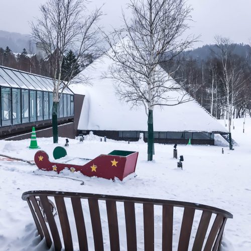 Outdoor patio with empty chair Outdoor patio with empty chair and snow